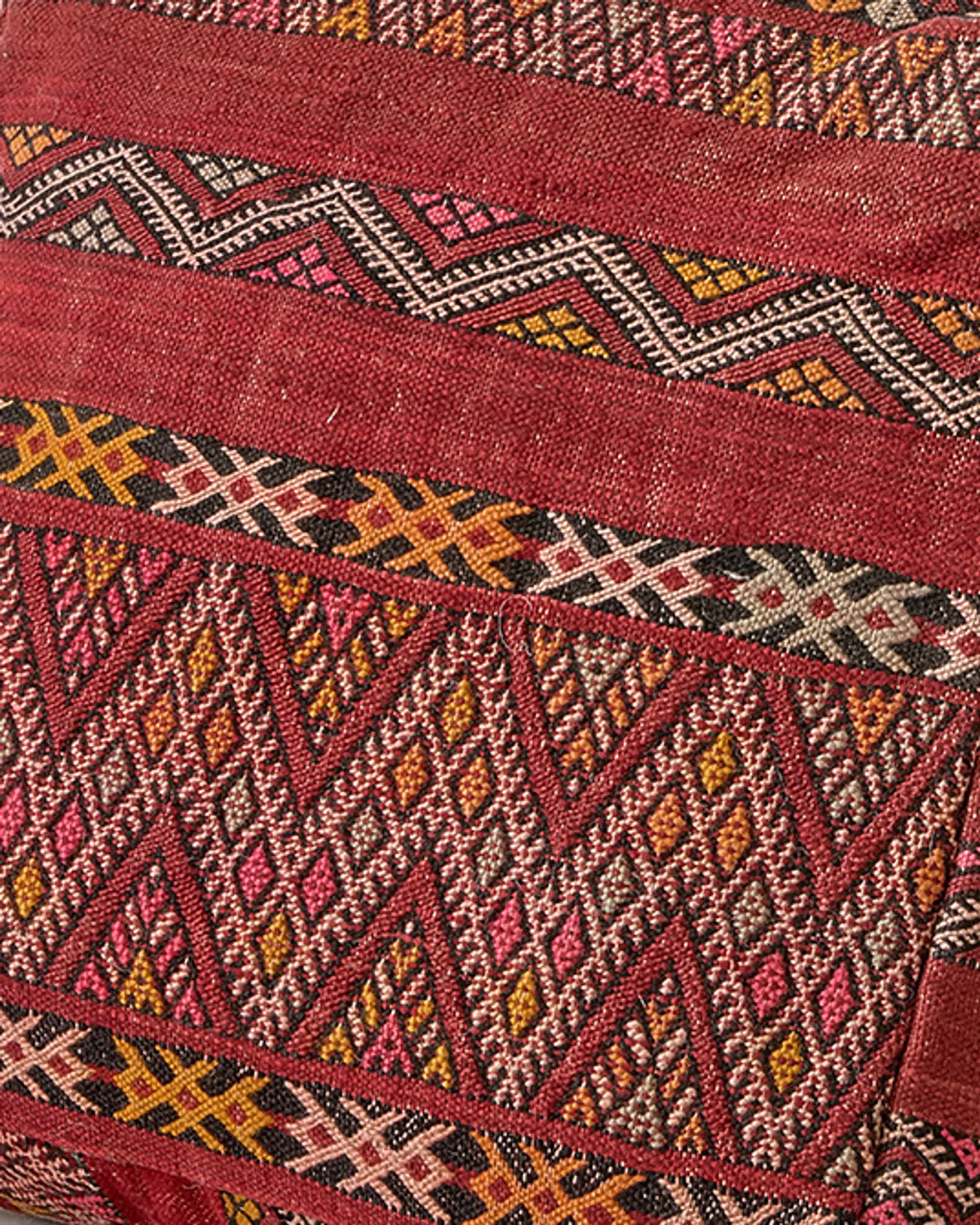 Vintage kilim pouf with lovely pattern close-up