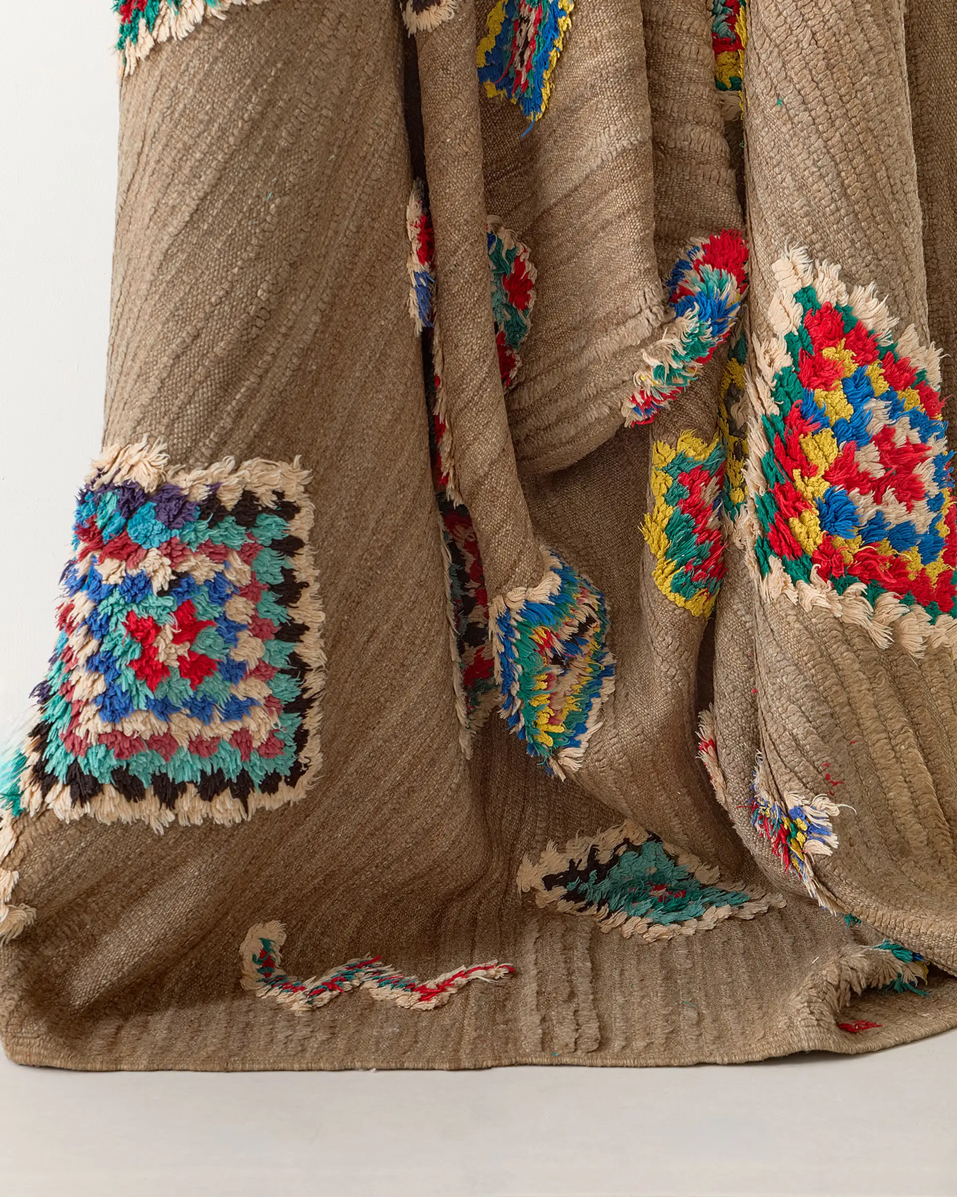 Vintage rug with floating motifs, texture