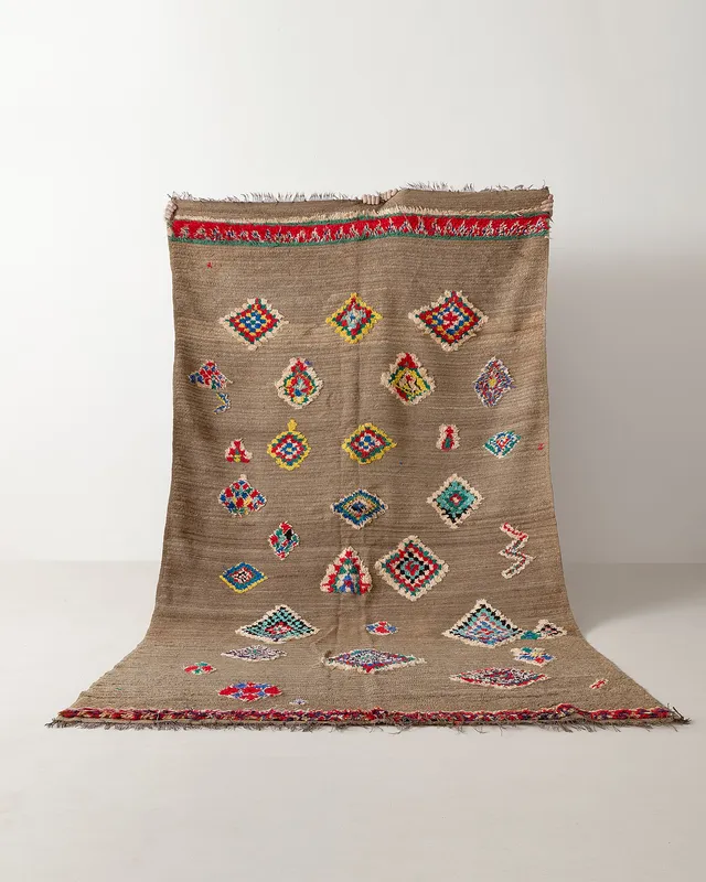 Vintage rug with floating motifs