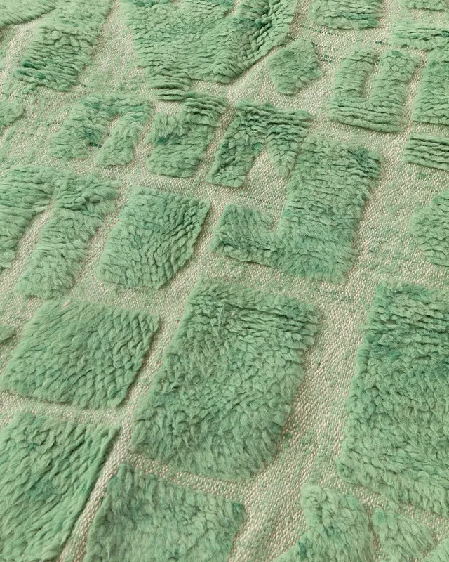 Tiny mint labyrinth rug close-up