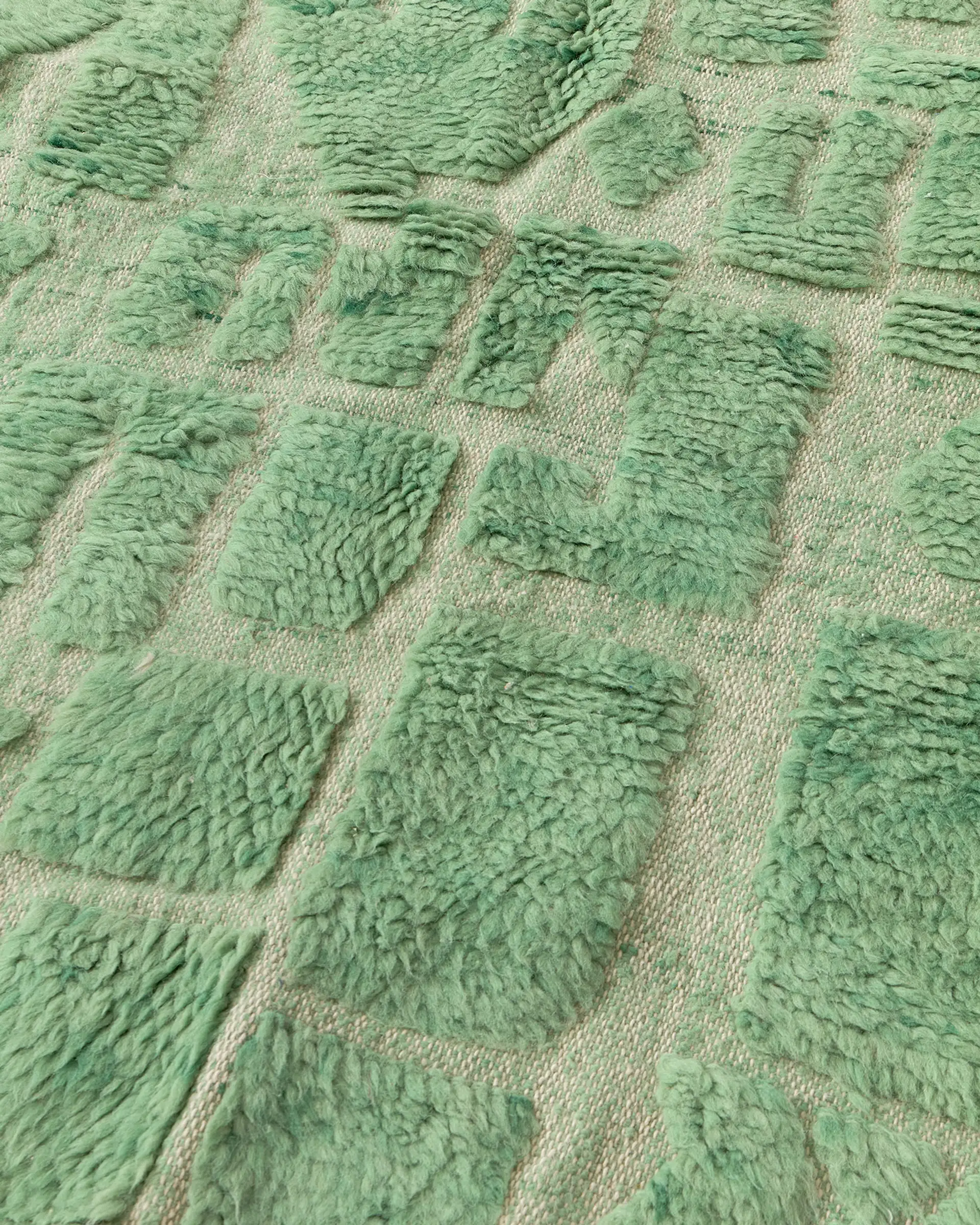 Tiny mint labyrinth rug close-up