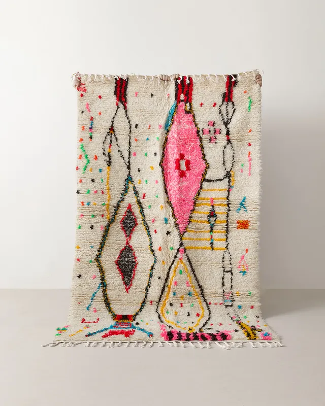 Azilal rug with feminine motifs