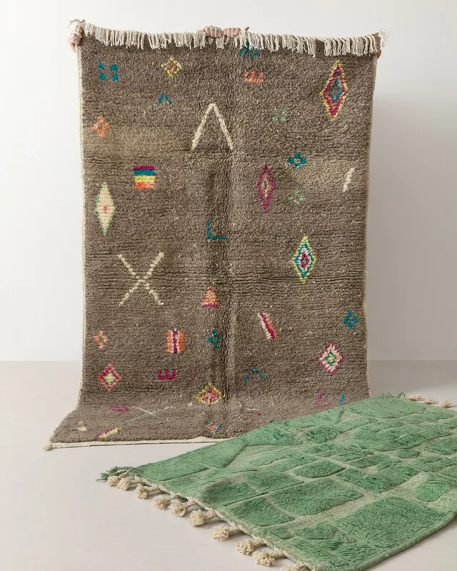 Grey and green rugs
